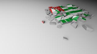 Abkhazia National Flag, A distant view of concrete with a shattered national flag printed on it