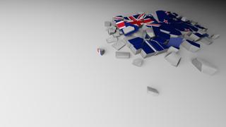 New-Zealand National Flag, A distant view of concrete with a shattered national flag printed on it