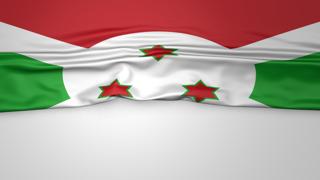 Burundi National Flag, Flag folded in half and placed on white paper