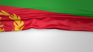 Eritrea National Flag, Flag folded in half and placed on white paper