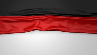 Germany National Flag, Flag folded in half and placed on white paper