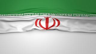 Iran National Flag, Flag folded in half and placed on white paper