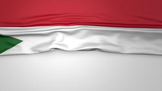 Republic-of-Sudan National Flag, Flag folded in half and placed on white paper