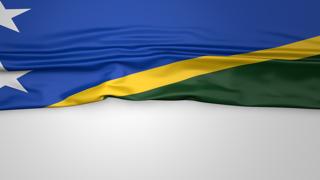 Solomon-Islands National Flag, Flag folded in half and placed on white paper