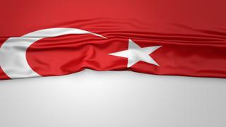 Turkiye National Flag, Flag folded in half and placed on white paper