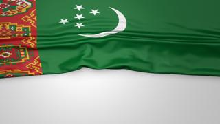 Turkmenistan National Flag, Flag folded in half and placed on white paper