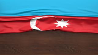 Azerbaijan National Flag, Flag folded in half and placed on wood desk