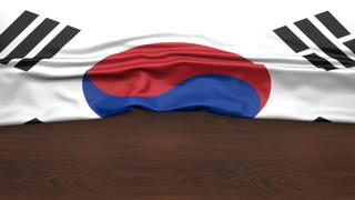 Korea National Flag, Flag folded in half and placed on wood desk