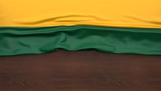 Lithuania National Flag, Flag folded in half and placed on wood desk