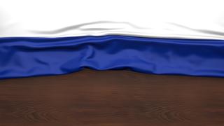 Russia National Flag, Flag folded in half and placed on wood desk