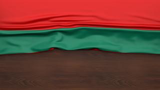 Transnistria National Flag, Flag folded in half and placed on wood desk