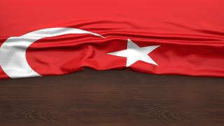 Turkiye National Flag, Flag folded in half and placed on wood desk