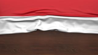 Yemen National Flag, Flag folded in half and placed on wood desk