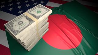 Bangladesh National Flag, American dollars and flag placed on top of the American flag