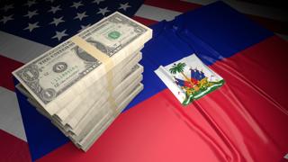 Haiti National Flag, American dollars and flag placed on top of the American flag