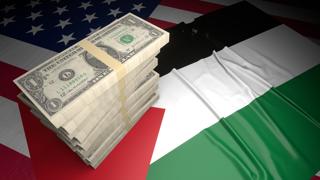 Palestine National Flag, American dollars and flag placed on top of the American flag