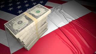 Poland National Flag, American dollars and flag placed on top of the American flag