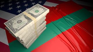 Transnistria National Flag, American dollars and flag placed on top of the American flag