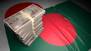 Bangladesh National Flag, Japanese yen and national flag placed on top of the Japanese flag