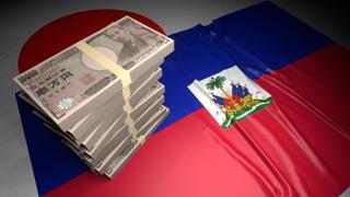 Haiti National Flag, Japanese yen and national flag placed on top of the Japanese flag