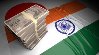 India National Flag, Japanese yen and national flag placed on top of the Japanese flag