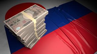 Liechtenstein National Flag, Japanese yen and national flag placed on top of the Japanese flag