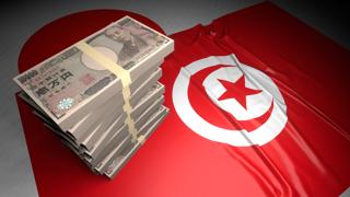 Tunisia National Flag, Japanese yen and national flag placed on top of the Japanese flag