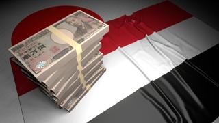 Yemen National Flag, Japanese yen and national flag placed on top of the Japanese flag