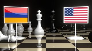 Armenia National Flag, Flag placed on a chessboard with the American flag in the background