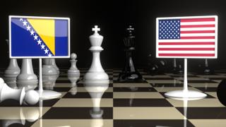 Bosnia-and-Herzegovina National Flag, Flag placed on a chessboard with the American flag in the background