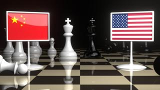 China National Flag, Flag placed on a chessboard with the American flag in the background