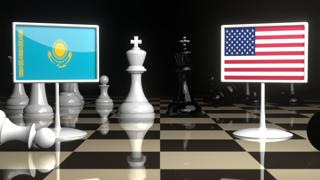 Kazakhstan National Flag, Flag placed on a chessboard with the American flag in the background