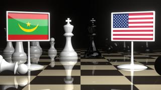 Mauritania National Flag, Flag placed on a chessboard with the American flag in the background