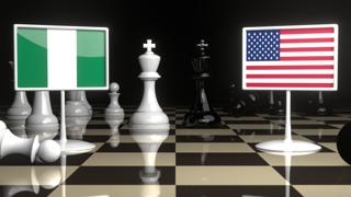 Nigeria National Flag, Flag placed on a chessboard with the American flag in the background