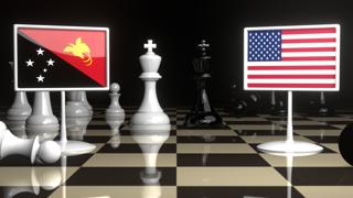 Papua-New-Guinea National Flag, Flag placed on a chessboard with the American flag in the background