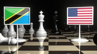 Tanzania National Flag, Flag placed on a chessboard with the American flag in the background