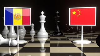 Andorra National Flag, The national flag on a chessboard with the Japanese flag in the background