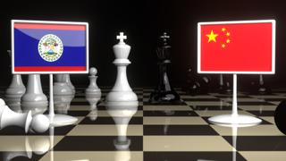 Belize National Flag, The national flag on a chessboard with the Japanese flag in the background