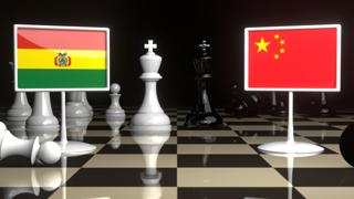 Bolivia National Flag, The national flag on a chessboard with the Japanese flag in the background