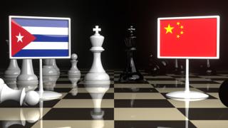 Cuba National Flag, The national flag on a chessboard with the Japanese flag in the background