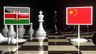 Kenya National Flag, The national flag on a chessboard with the Japanese flag in the background