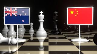 New-Zealand National Flag, The national flag on a chessboard with the Japanese flag in the background