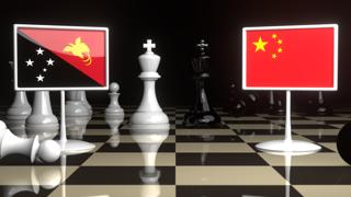 Papua-New-Guinea National Flag, The national flag on a chessboard with the Japanese flag in the background