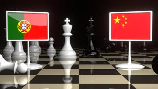 Portugal National Flag, The national flag on a chessboard with the Japanese flag in the background