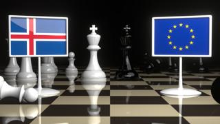 Iceland National Flag, Flags placed on a chessboard with the EU flag in the background