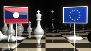 Laos National Flag, Flags placed on a chessboard with the EU flag in the background