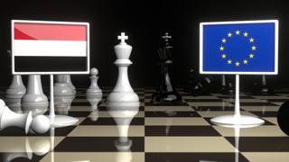 Yemen National Flag, Flags placed on a chessboard with the EU flag in the background