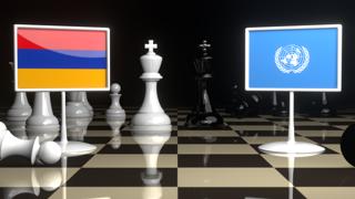 Armenia National Flag, Flags placed on a chessboard with the UN flag in the background