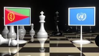 Eritrea National Flag, Flags placed on a chessboard with the UN flag in the background