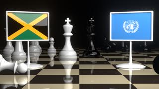 Jamaica National Flag, Flags placed on a chessboard with the UN flag in the background